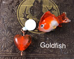 The fish bead is CiM Peace with a layer of London Fog and Goldfish. Both London Fog and Goldfish were the perfect consistency for sculpting- stiff but not too stiff.