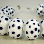 Lapis dots on opaque white