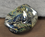 Core of clear, encased in Hades, with silver foil, Ivory, Kronos, & fine silver wire