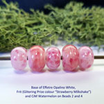 Base of Effetre Opalino White, Frit (Glittering Prize colour “Strawberry Milkshake”) and Watermelon wrapped over the 2nd and 4th bead.
