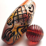 Fish focal is Indian Summer over a clear base; spacer is Indian Summer