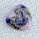 CiM Rapunzel as the base for a heart with silvered ivory and Effetre Blue Ink