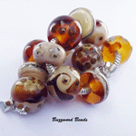 Ginger with Reichenbach Mystic Beige and Effetre medium topaz