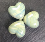 These beads have been created with Pachamama and.......nothing else. The effect is gorgeous, like very fine wood grain patterns.
