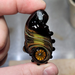CiM Bird's Nest over a pea green core with transparent black
