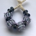 CiM Gelly's Sty, spacer beads are made of Mockingbird and stripes in the bigger beads are Denim.