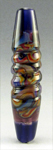 Berry Punch base, Tibet swirl and a Fire Lotus/Yellow Opal/Indigo latticino swirled on top of the Tibet;   Sapphire endcaps